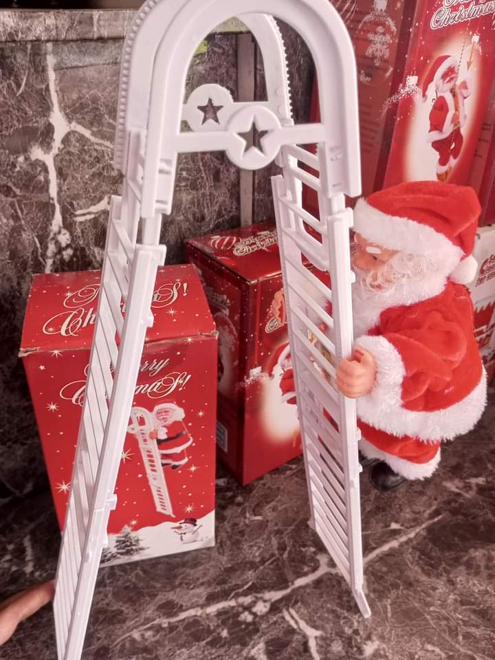 SANTA CLAUS CLIMBING ON THE LADDER