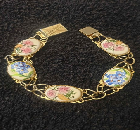 Cute bracelet with enamel inserts