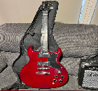 Artist electric guitar and 10 watt amp